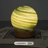 p_1783363013821_bcma Cross-border Wandering Planet Star Lamp Solid Wood Night Light Sunset Lamp Desk Lamp Ambiance Bedside Birthday Gift